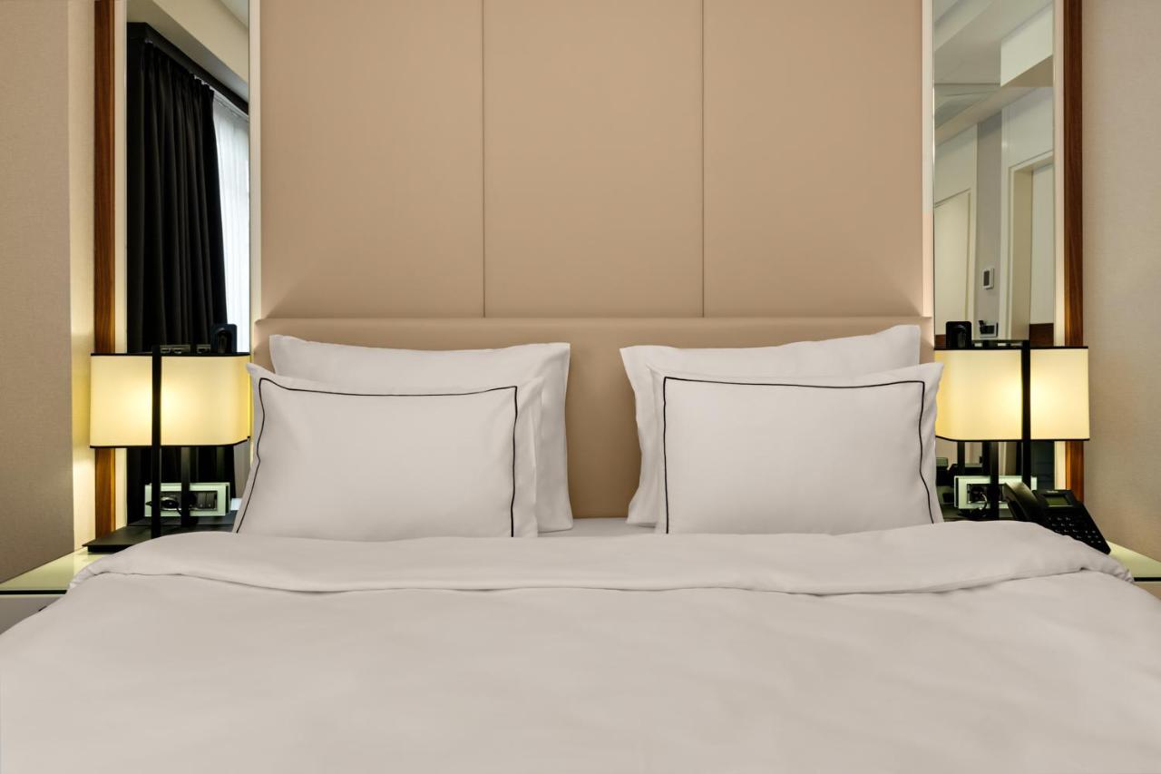 Gleam Collection Hotel 伊斯坦布尔 外观 照片 A bed with two pillows